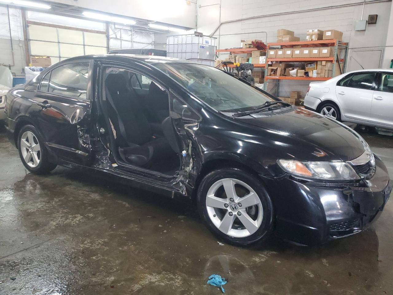 2009 Honda Civic VIN 2HGFA16669H324671 Copart auction photo, side / front end damage thumbnail 4