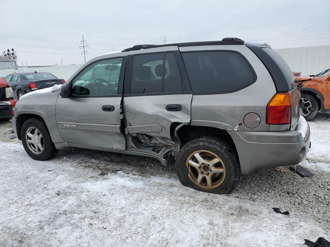 2005 GMC Envoy VIN 1GKDT13SX52196086 Copart auction photo, side damage thumbnail 2