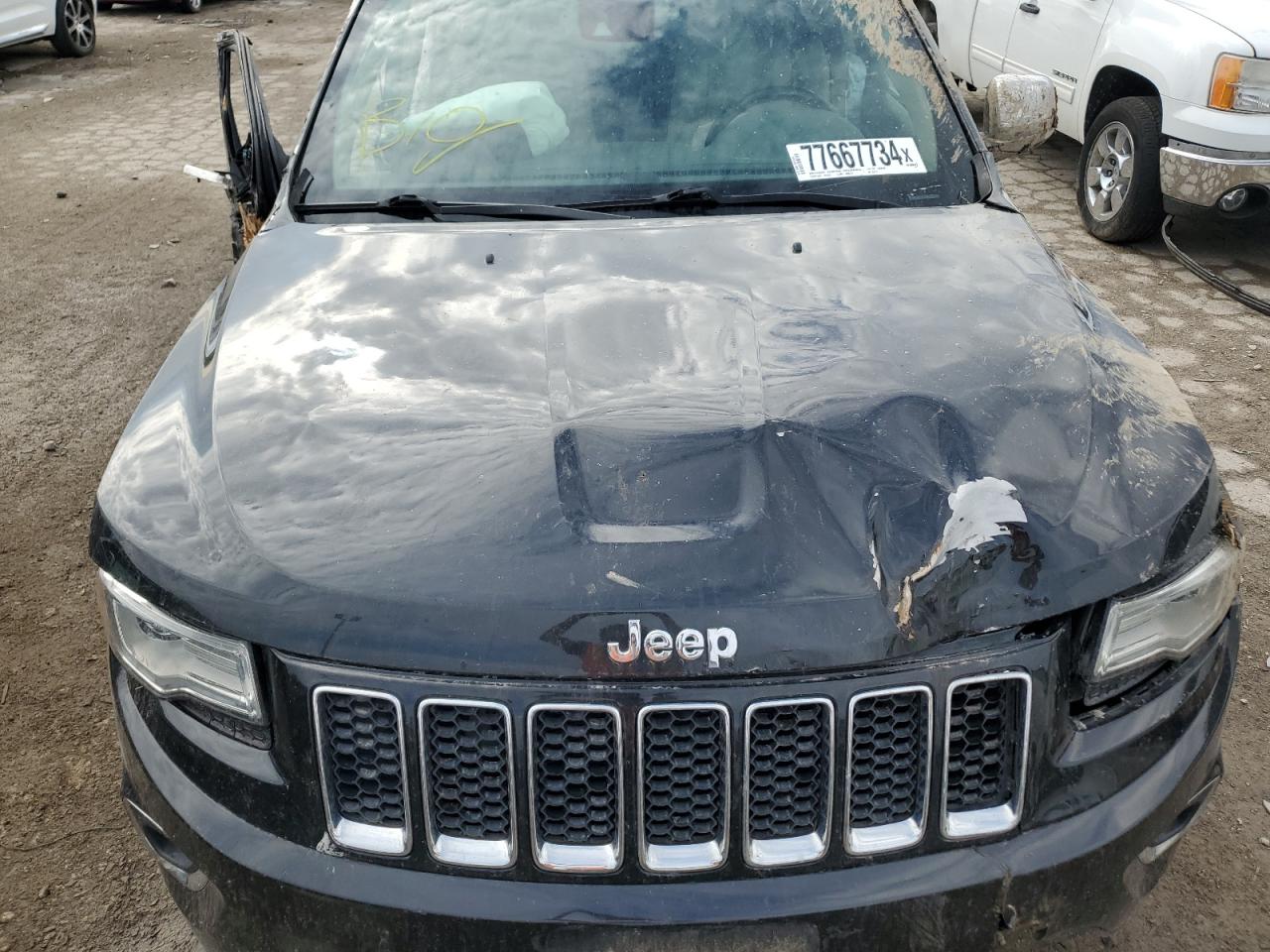 2015 Jeep Grand Cherokee VIN 1C4RJFCG8FC950775 Copart auction photo, side / front end damage thumbnail 12