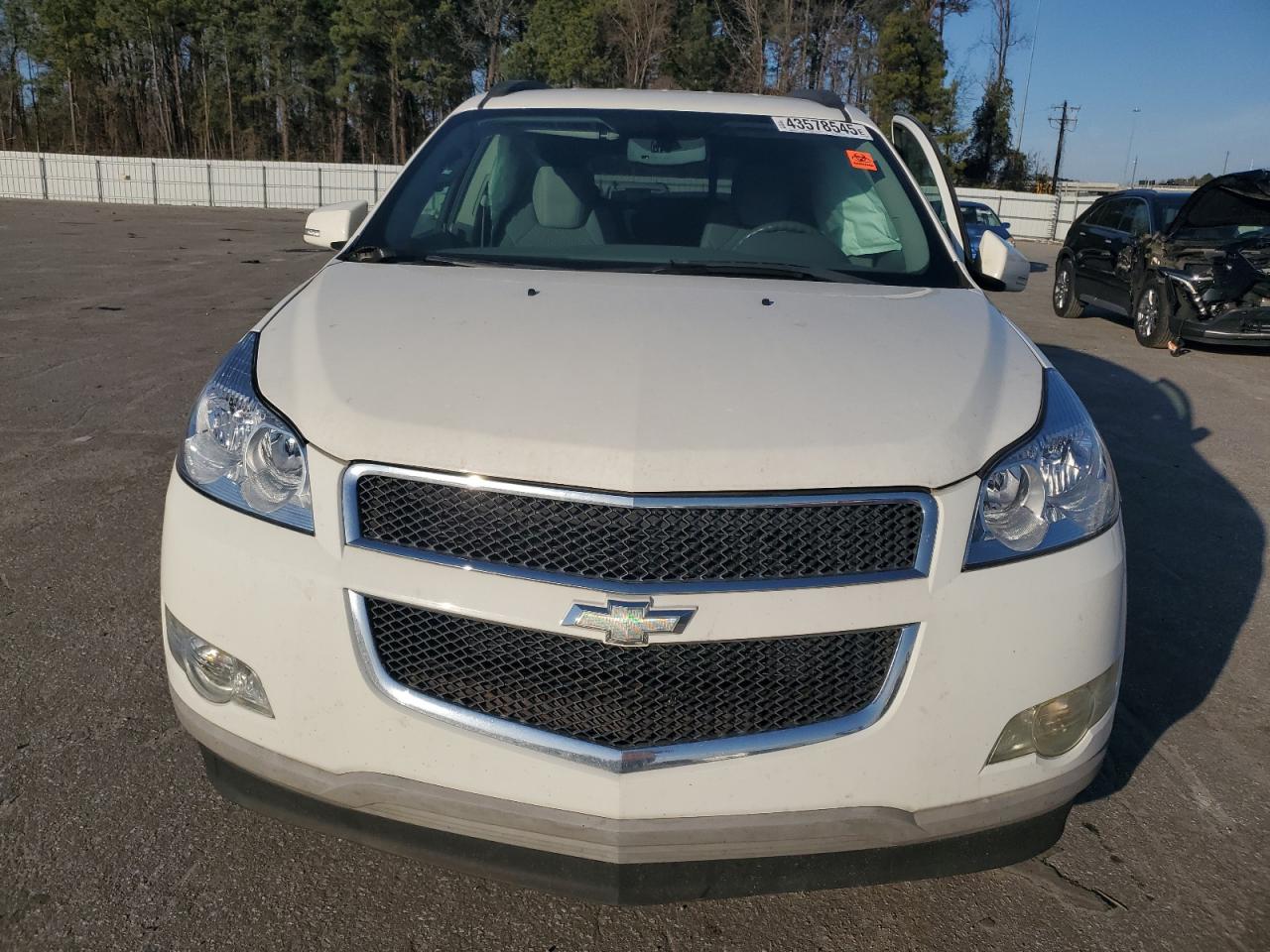 2012 Chevrolet Traverse VIN 1GNKRGED8CJ169434 Copart auction photo, side damage thumbnail 5