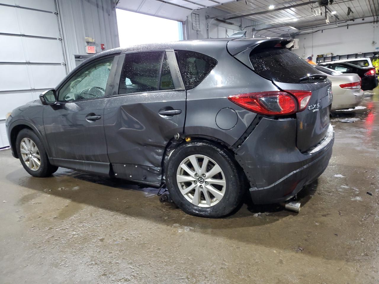 2014 Mazda CX-5 VIN JM3KE4CY6E0421738 Copart auction photo, side / undercarriage damage thumbnail 2