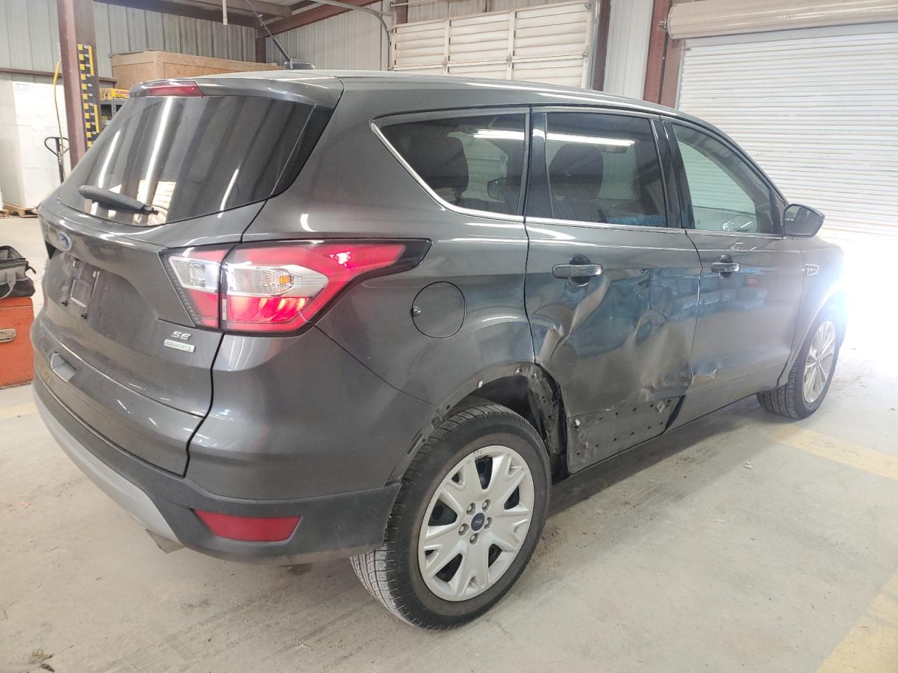 2017 Ford Escape VIN 1FMCU0G90HUD53053 Copart auction photo, side / minor dent/scratches damage thumbnail 3