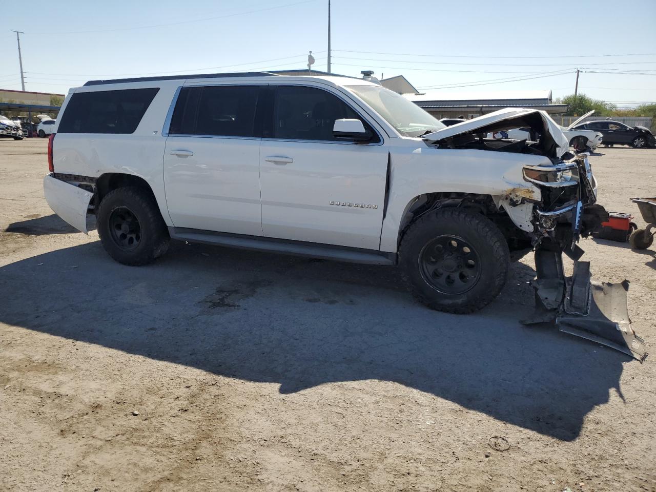 2017 Chevrolet Suburban VIN 1GNSCHKC7HR171574 Copart auction photo, front end / rear end damage thumbnail 4