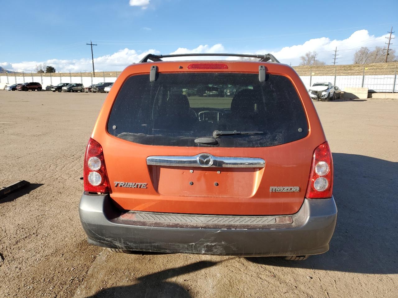 2005 Mazda Tribute VIN 4F2CZ04165KM06608 Copart auction photo, minor dent/scratches damage thumbnail 6