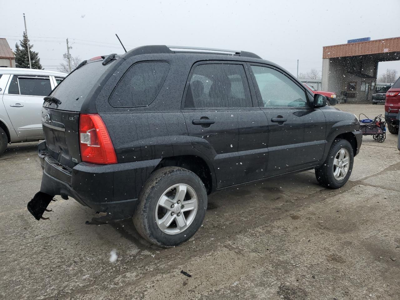 2009 KIA Sportage VIN KNDJF723997631529 Copart auction photo, front end / rear end damage thumbnail 3