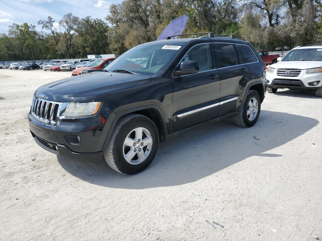 2011 Jeep Grand Cherokee VIN 1J4RS4GG8BC604029 - Copart auction photo