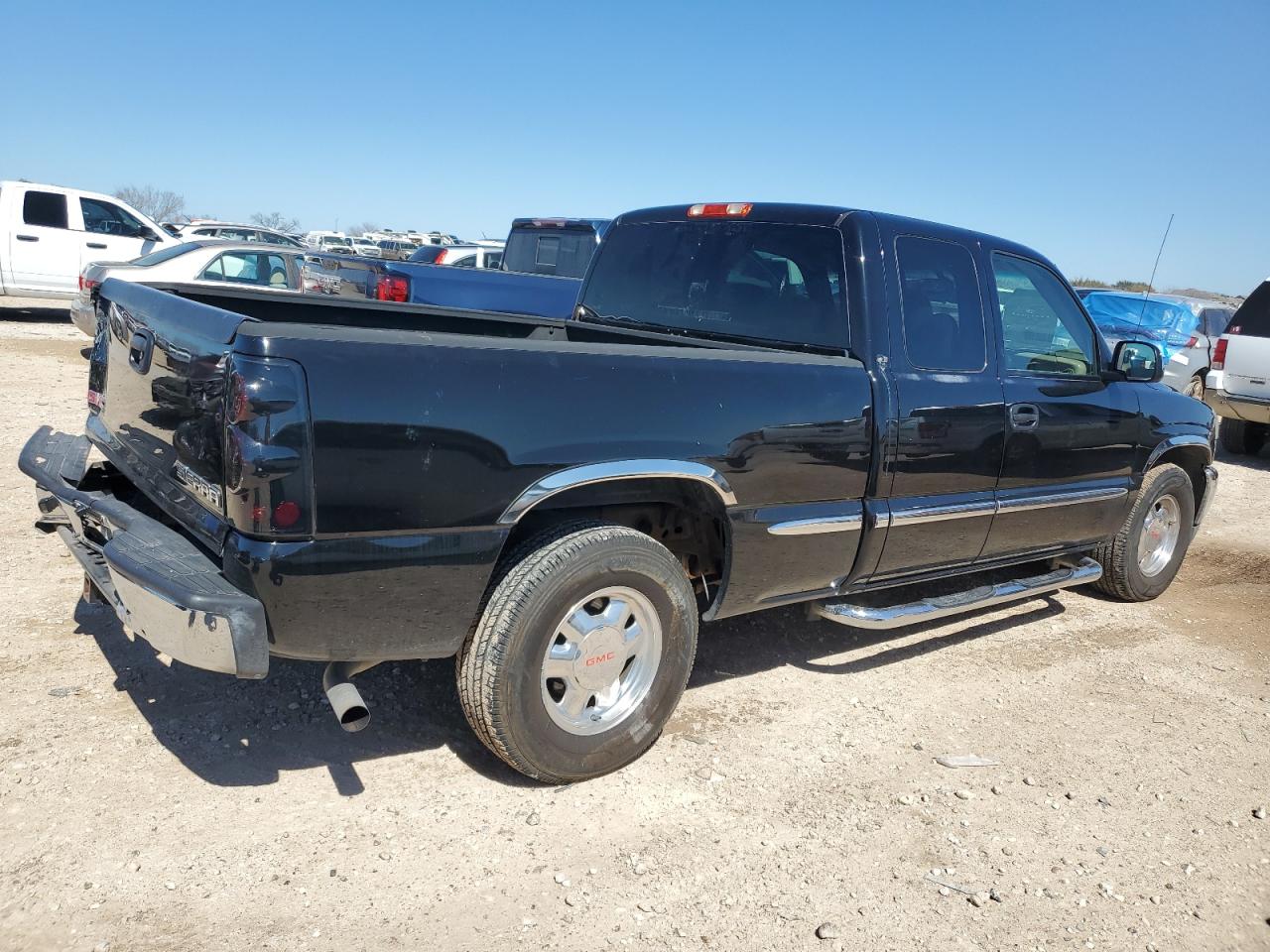 2002 GMC Sierra VIN 2GTEC19V221171583 Copart auction photo, rear end / minor dent/scratches damage thumbnail 3