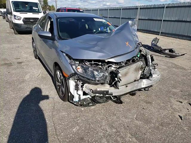 2021 Honda Civic VIN 2HGFC2F64MH515515 Copart auction photo, front end / side damage thumbnail 11