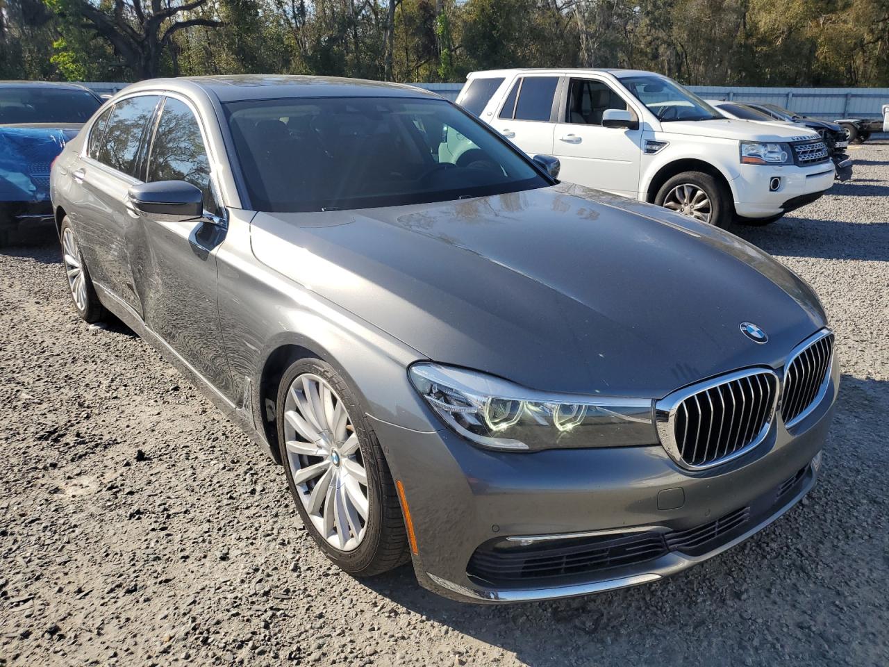 2016 BMW 7er VIN WBA7E2C51GG503912 Copart auction photo, side damage thumbnail 4