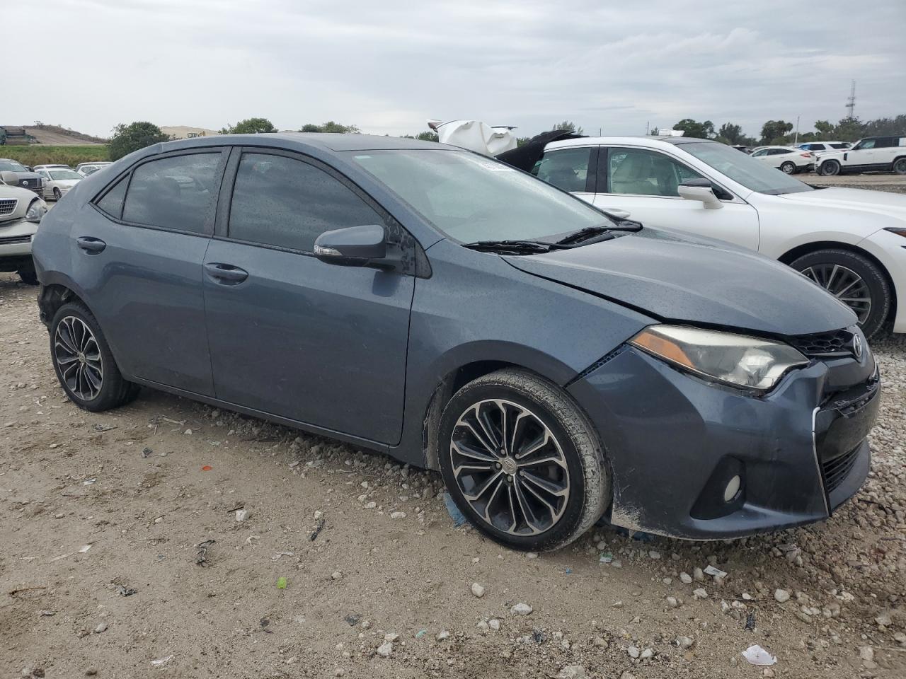 2015 Toyota Corolla VIN 5YFBURHE4FP284555 Copart auction photo, rear end / all over damage thumbnail 4
