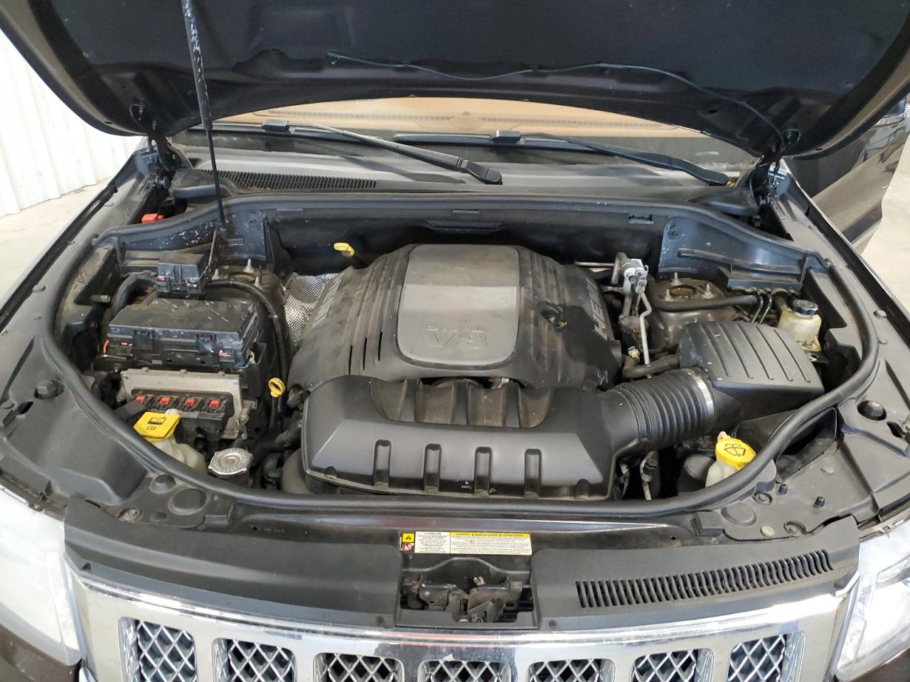 2012 Jeep Grand Cherokee VIN 1C4RJECT5CC277561 Copart auction photo, side damage thumbnail 12