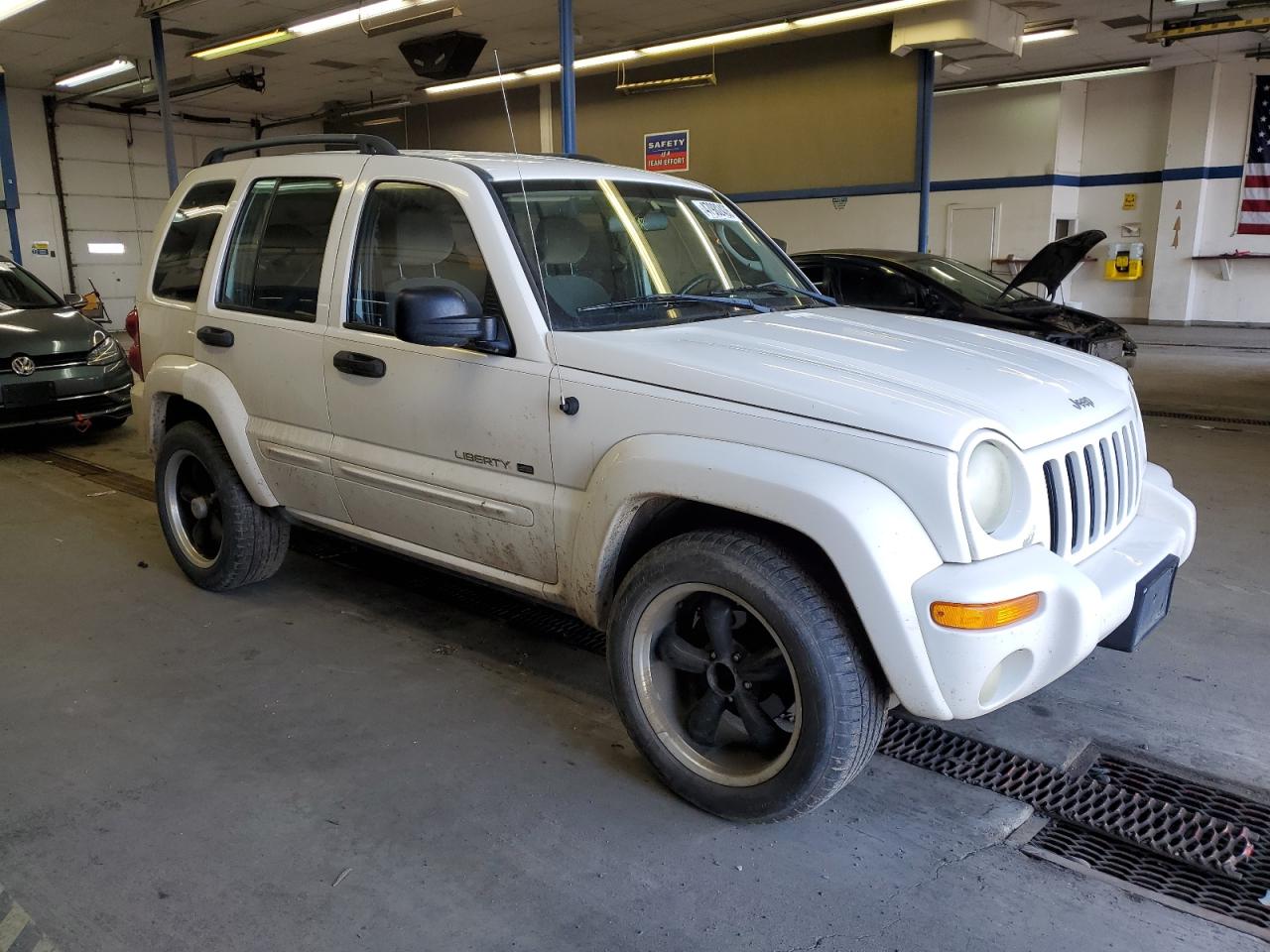 2003 Jeep Liberty (North America) VIN 1J4GL58K33W639705 Copart auction photo, side damage thumbnail 4