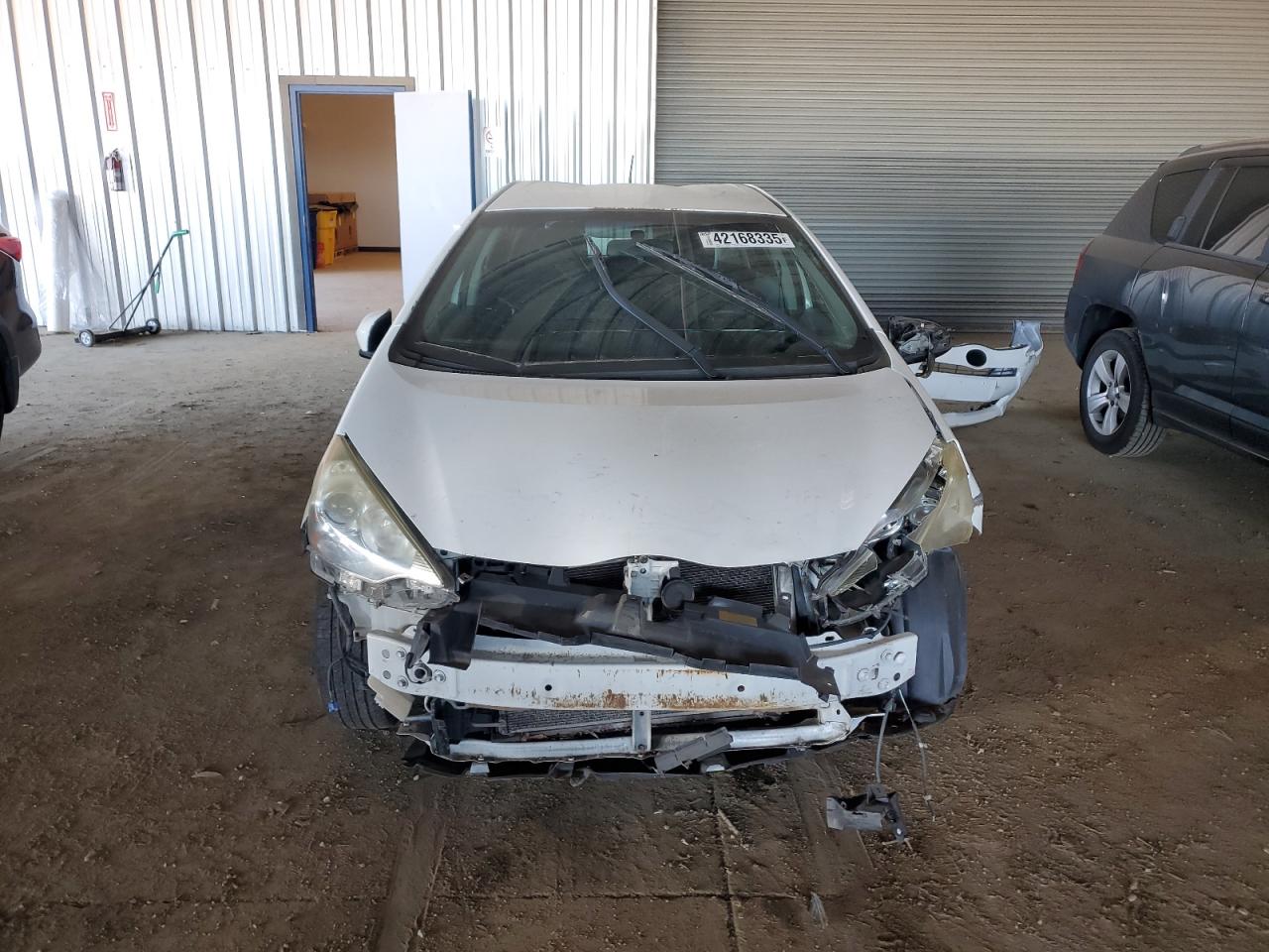 2014 Toyota Prius VIN JTDKDTB35E1070522 Copart auction photo, front end damage thumbnail 5
