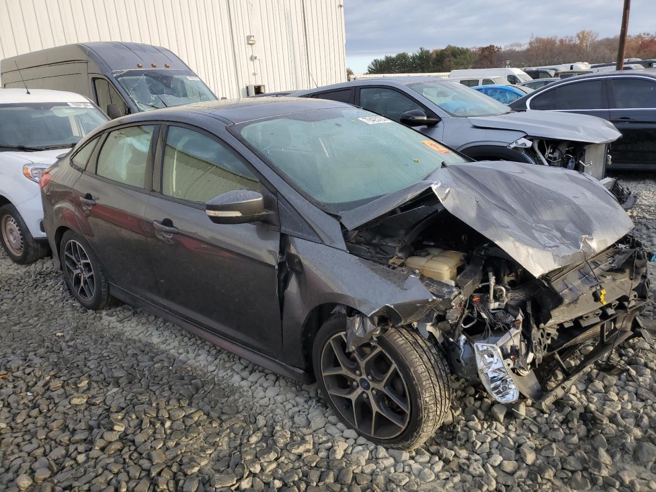 2015 Ford Focus VIN 1FADP3F21FL237696 Copart auction photo, front end / side damage thumbnail 4