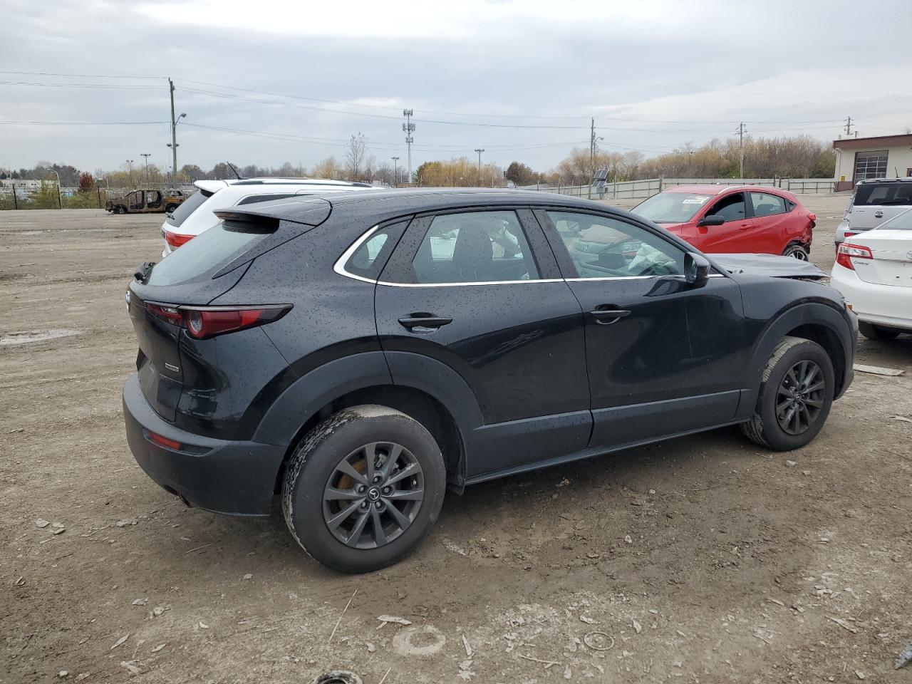 2022 Mazda CX-30 VIN 3MVDMBAL0NM419575 Copart auction photo, front end / minor dent/scratches damage thumbnail 3