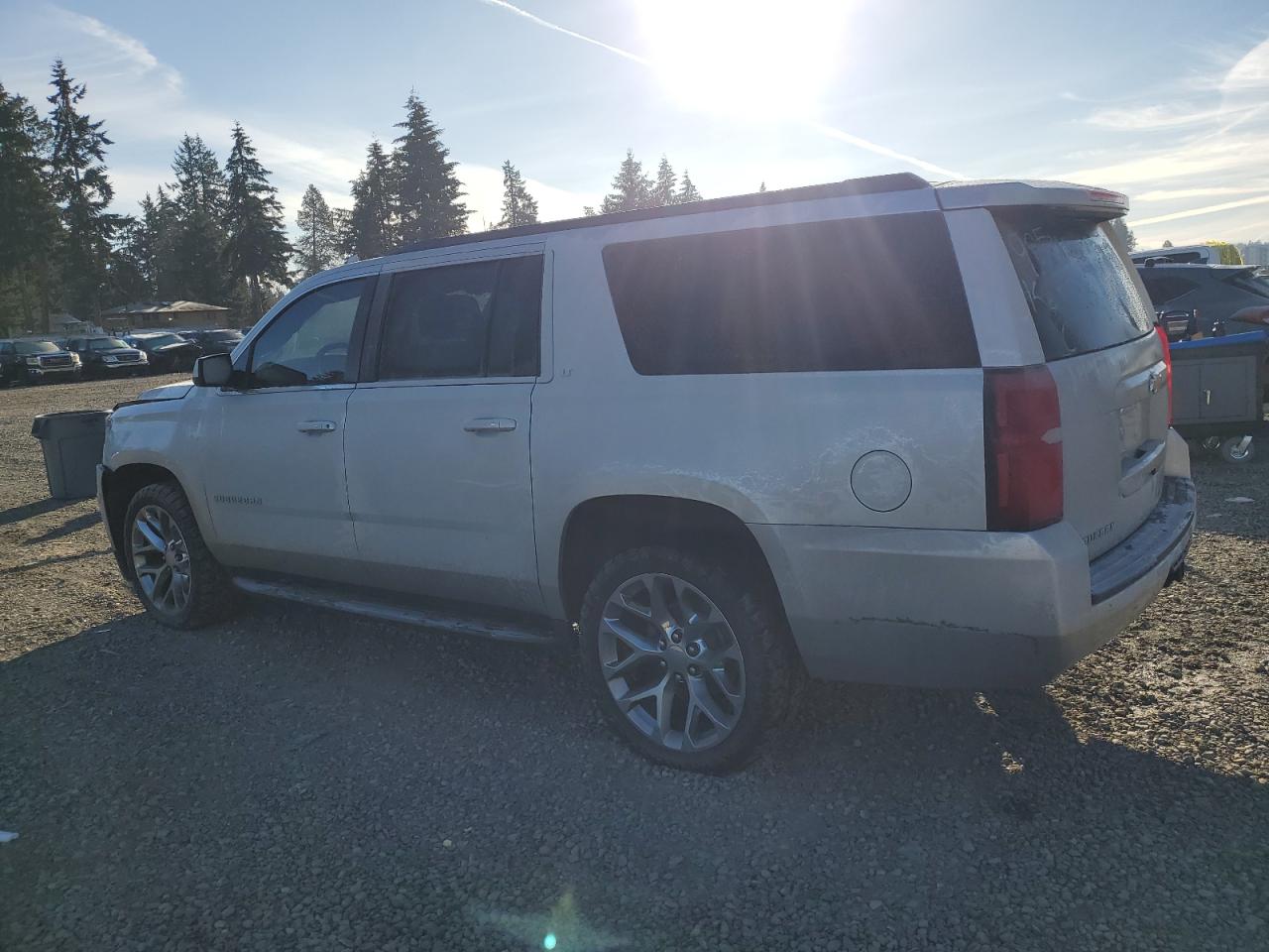 2018 Chevrolet Suburban VIN 1GNSKHKC7JR358788 Copart auction photo, side / front end damage thumbnail 2