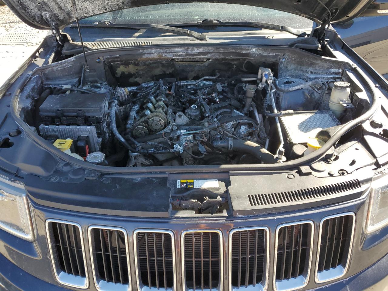 2014 Jeep Grand Cherokee VIN 1C4RJFBG8EC351018 Copart auction photo, burn damage thumbnail 13