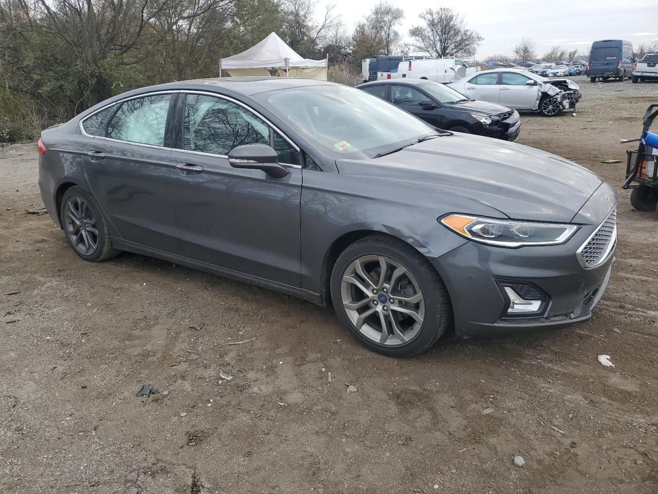 2020 Ford Fusion VIN 3FA6P0RUXLR129899 Copart auction photo, front end / side damage thumbnail 4