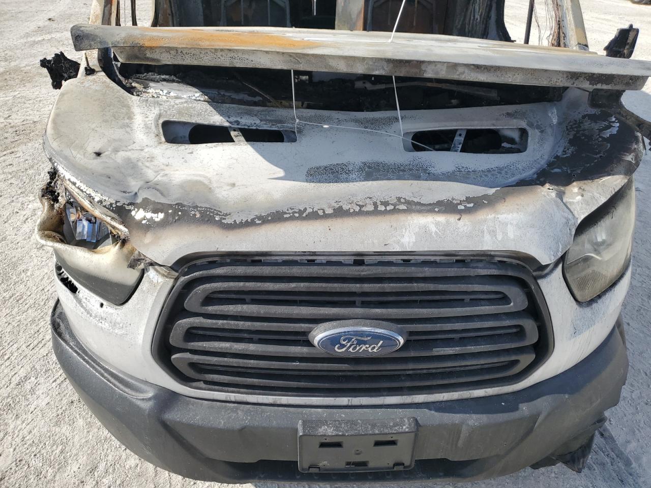 2017 Ford Transit VIN 1FTYR2CM7HKB03497 Copart auction photo, burn damage thumbnail 12