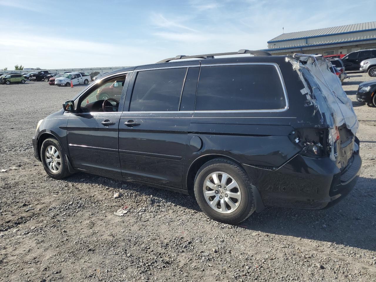 2009 Honda Odyssey VIN 5FNRL38759B019918 Copart auction photo, rear end / minor dent/scratches damage thumbnail 2