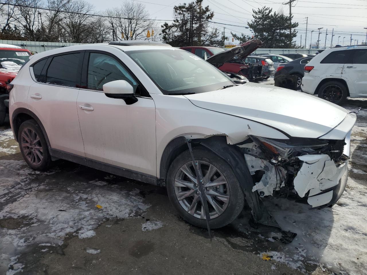 2021 Mazda CX-5 VIN JM3KFBEY5M0345779 Copart auction photo, front end damage thumbnail 4