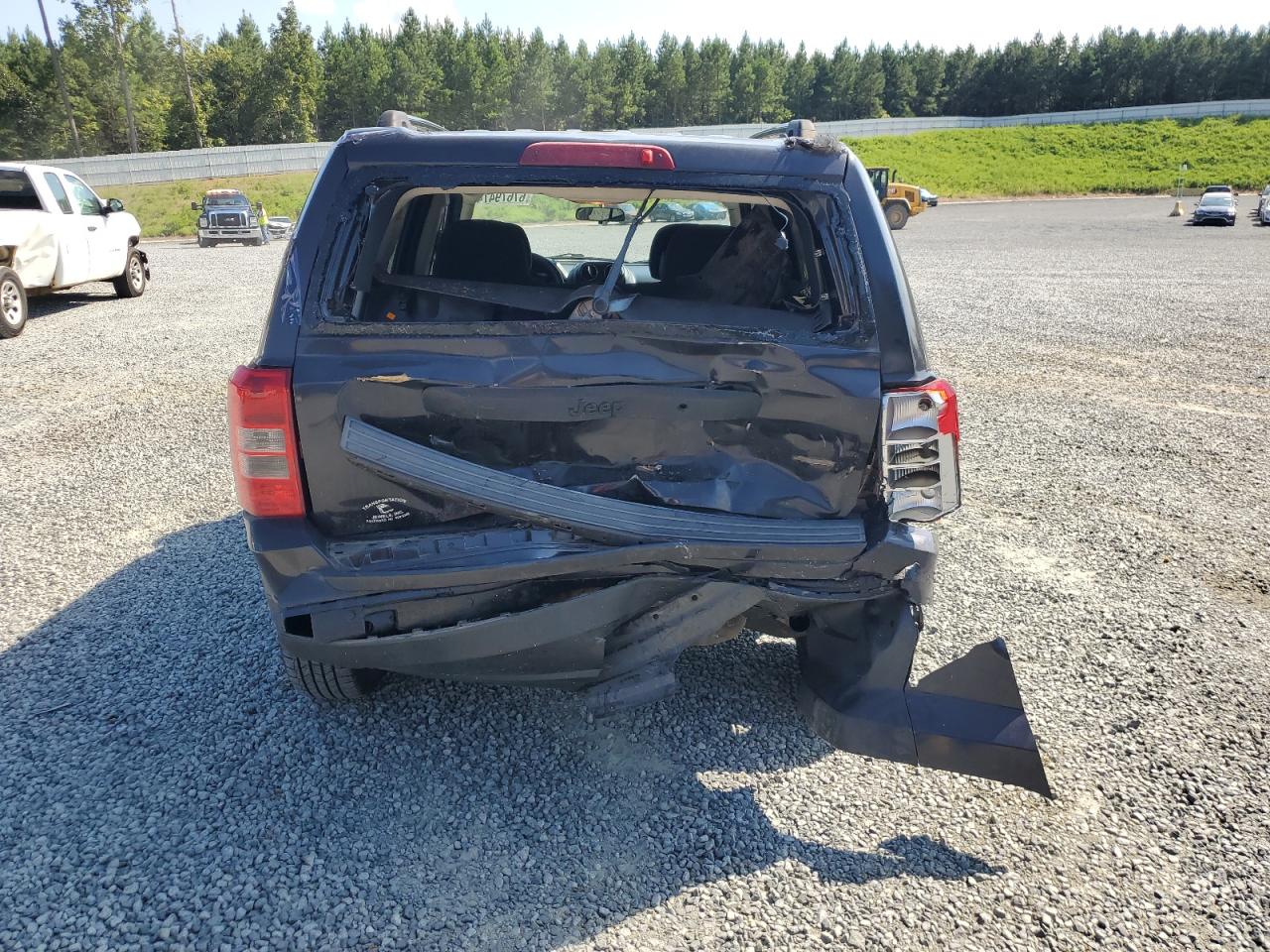 2015 Jeep Liberty (Patriot) VIN 1C4NJPBA8FD341617 Copart auction photo, rear end damage thumbnail 6