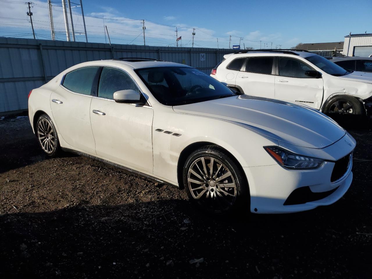 2017 Maserati Ghibli VIN ZAM57RTA9H1212620 Copart auction photo, vandalism / minor dent/scratches damage thumbnail 4