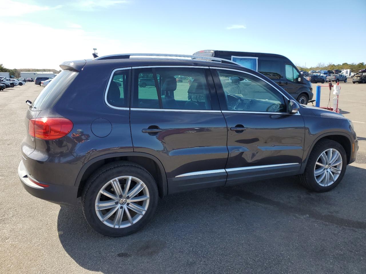 2016 Volkswagen Tiguan VIN WVGAV7AX7GW546596 Copart auction photo, water/flood / side damage thumbnail 3