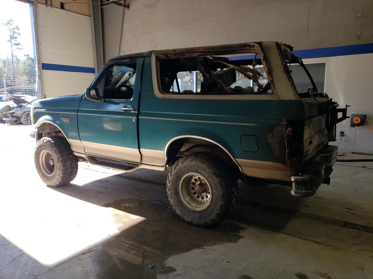 1996 Ford Bronco VIN 1FMEU15H6TLA69143 Copart auction photo, burn - interior / burn - engine damage thumbnail 2