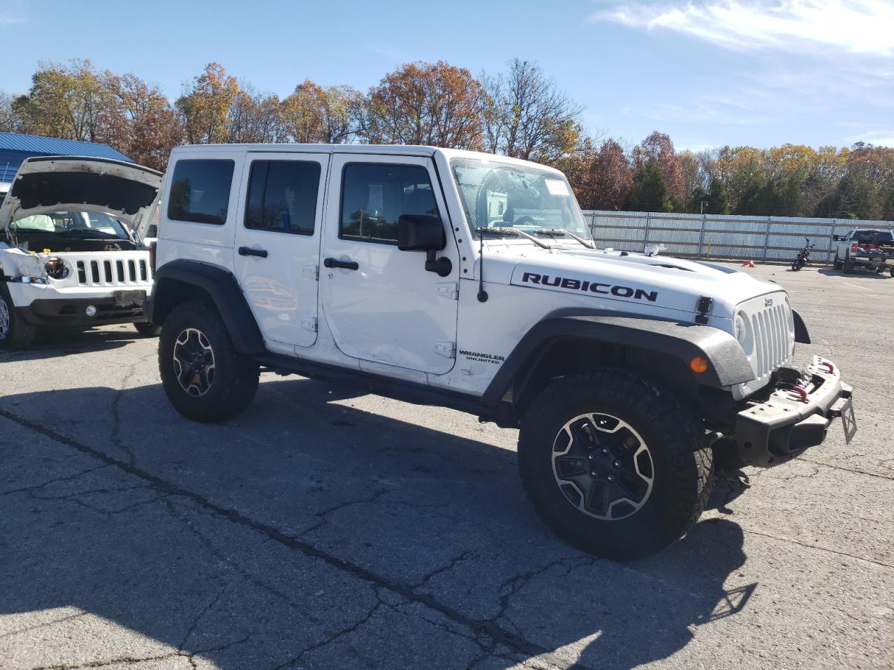 2015 Jeep Wrangler VIN 1C4HJWFG0FL615405 Copart auction photo, side / minor dent/scratches damage thumbnail 4