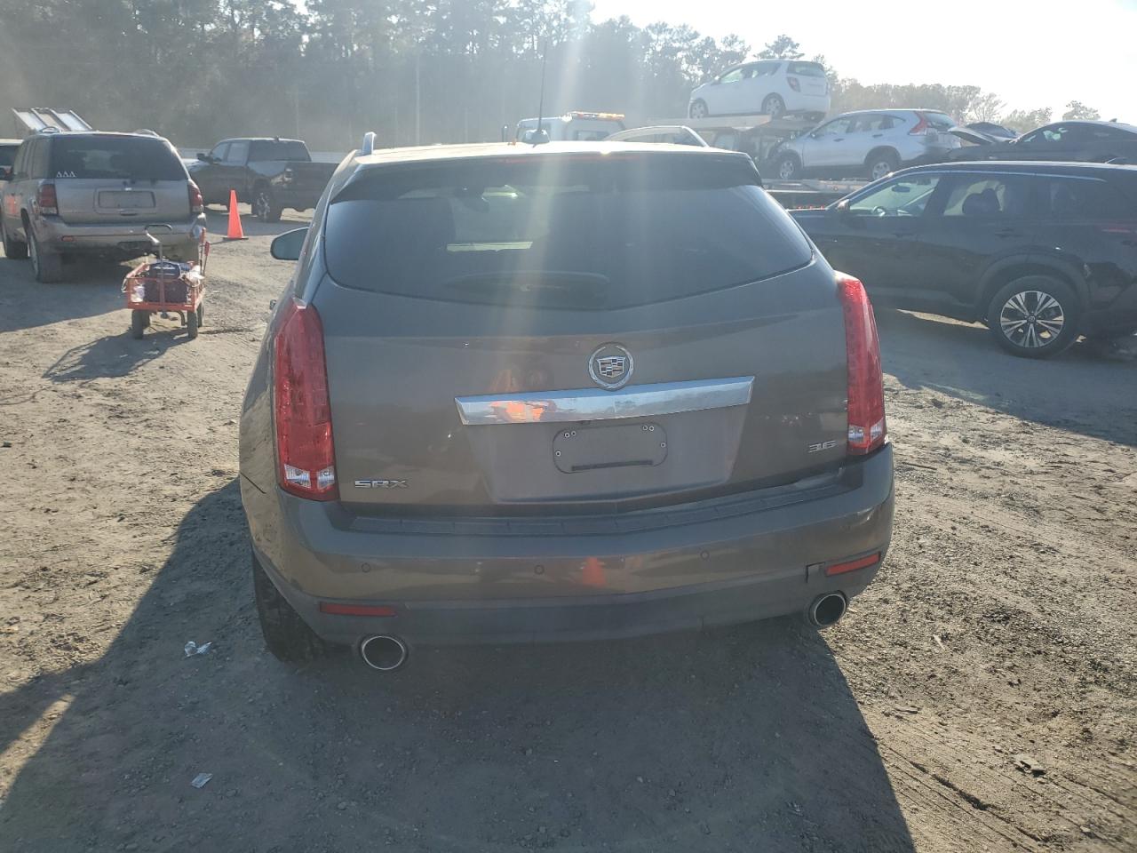 2016 Cadillac SRX VIN 3GYFNBE30GS527995 Copart auction photo, undercarriage damage thumbnail 6
