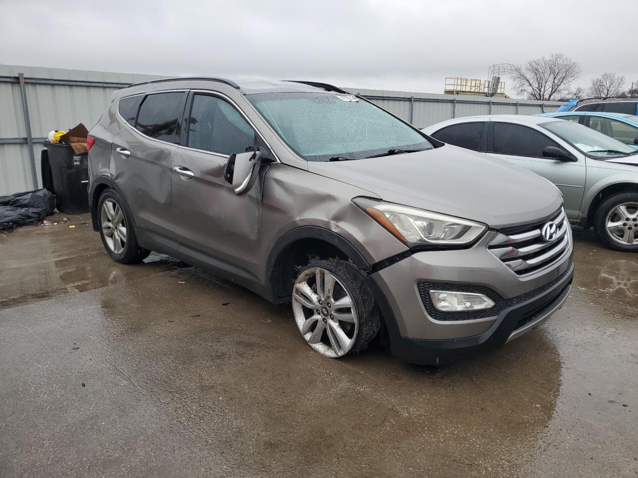 2013 Hyundai Santa Fe VIN 5XYZU3LA8DG054924 Copart auction photo, rollover damage thumbnail 4