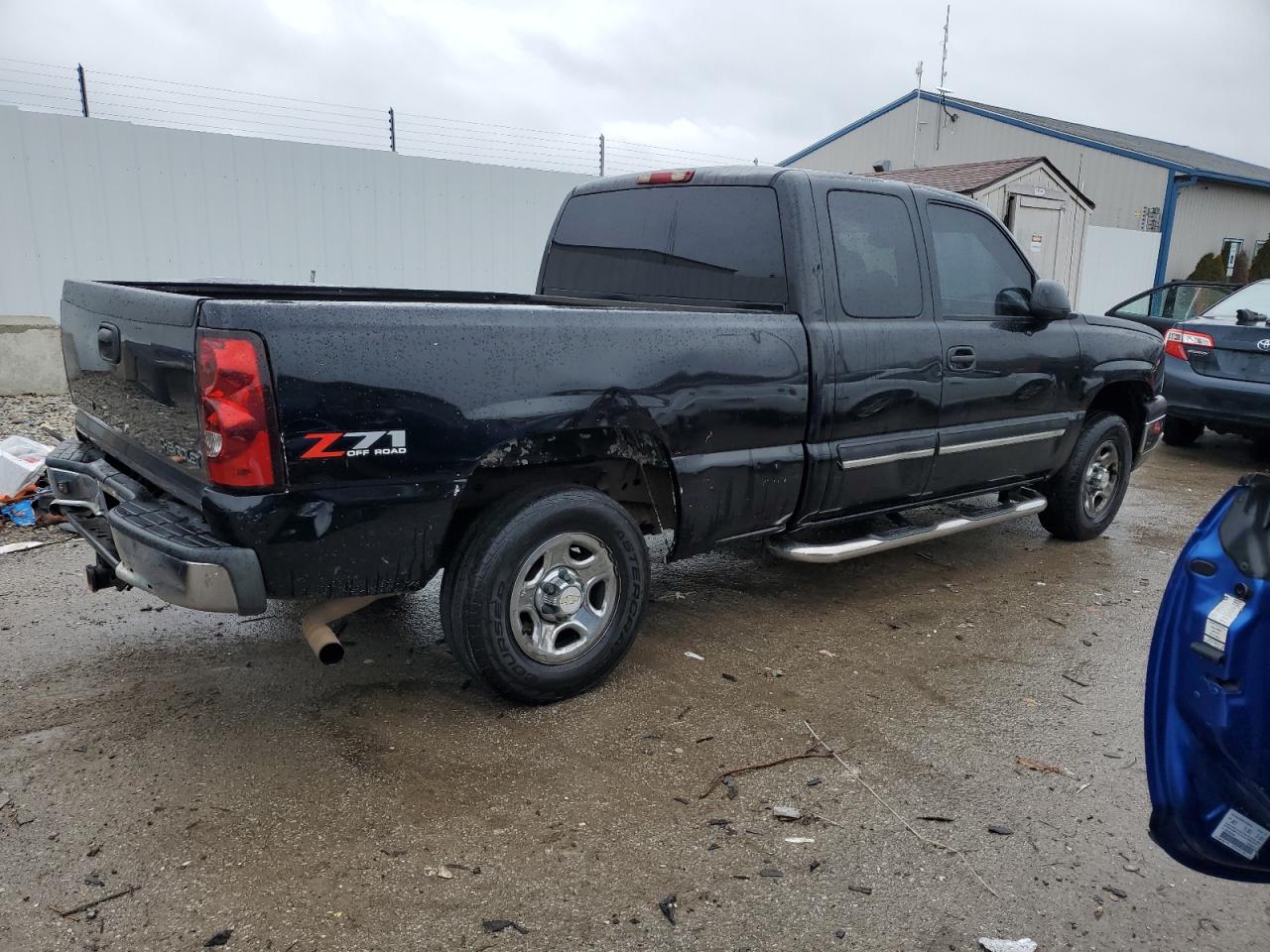 2003 Chevrolet Silverado VIN 2GCEK19T831382242 Copart auction photo, side / rear end damage thumbnail 3