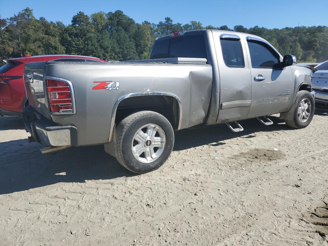 2012 Chevrolet Silverado VIN 1GCRKSE76CZ270224 Copart auction photo, front end / side damage thumbnail 3