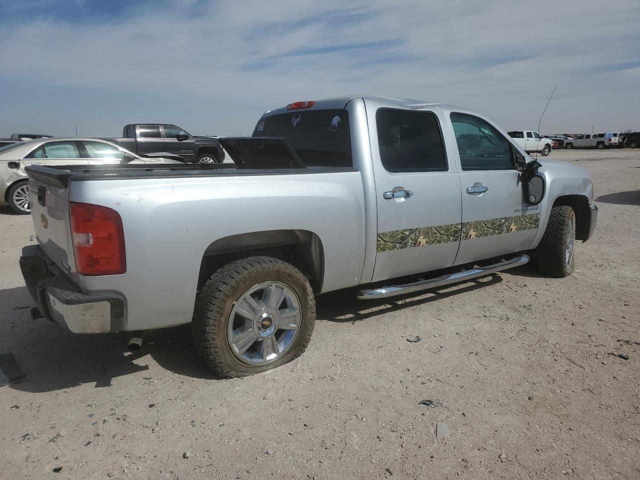 2012 Chevrolet Silverado VIN 3GCPCSE01CG302214 Copart auction photo, side / front end damage thumbnail 3