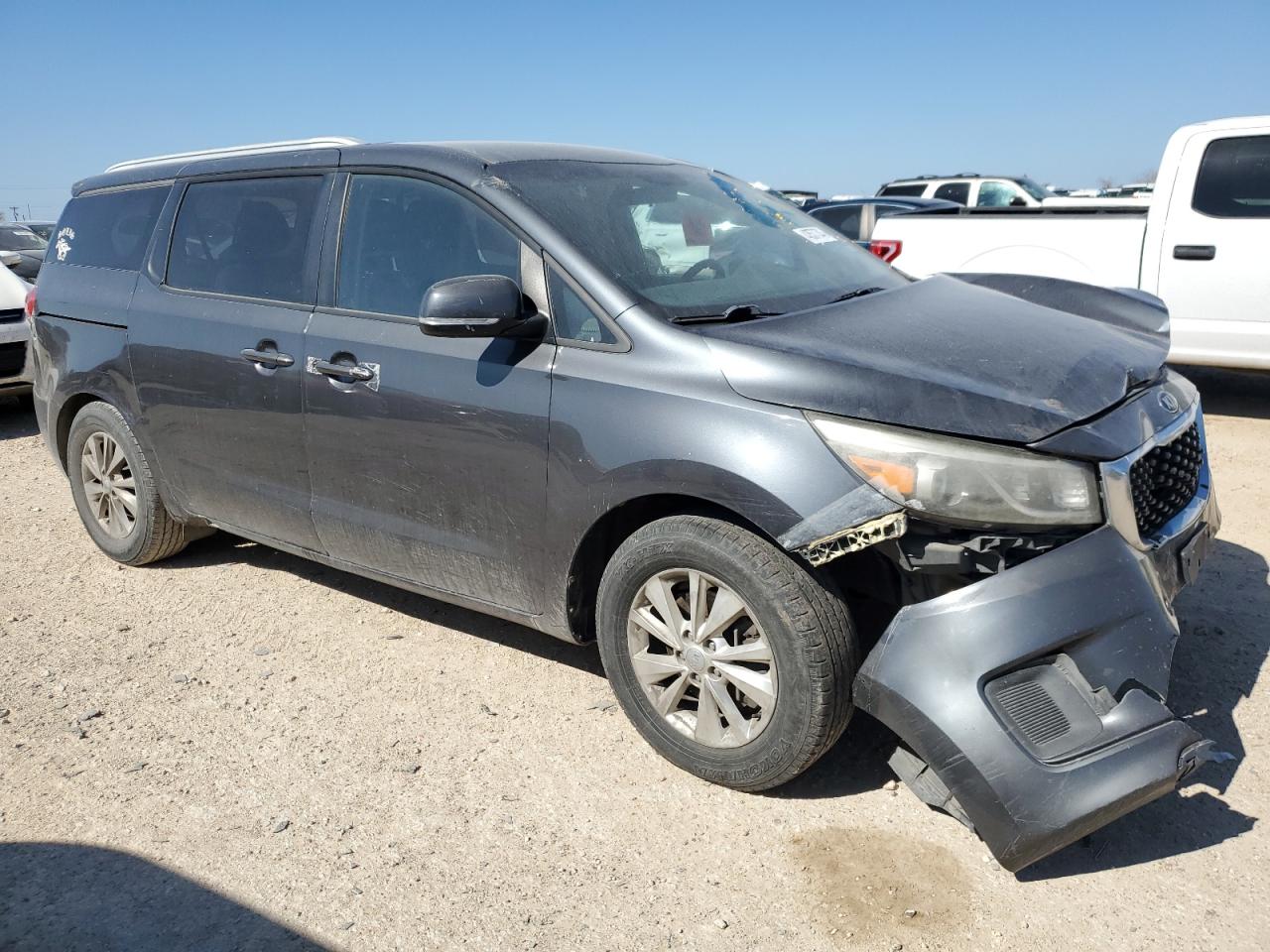 2015 KIA Sedona VIN KNDMB5C17F6057783 Copart auction photo, front end / side damage thumbnail 4