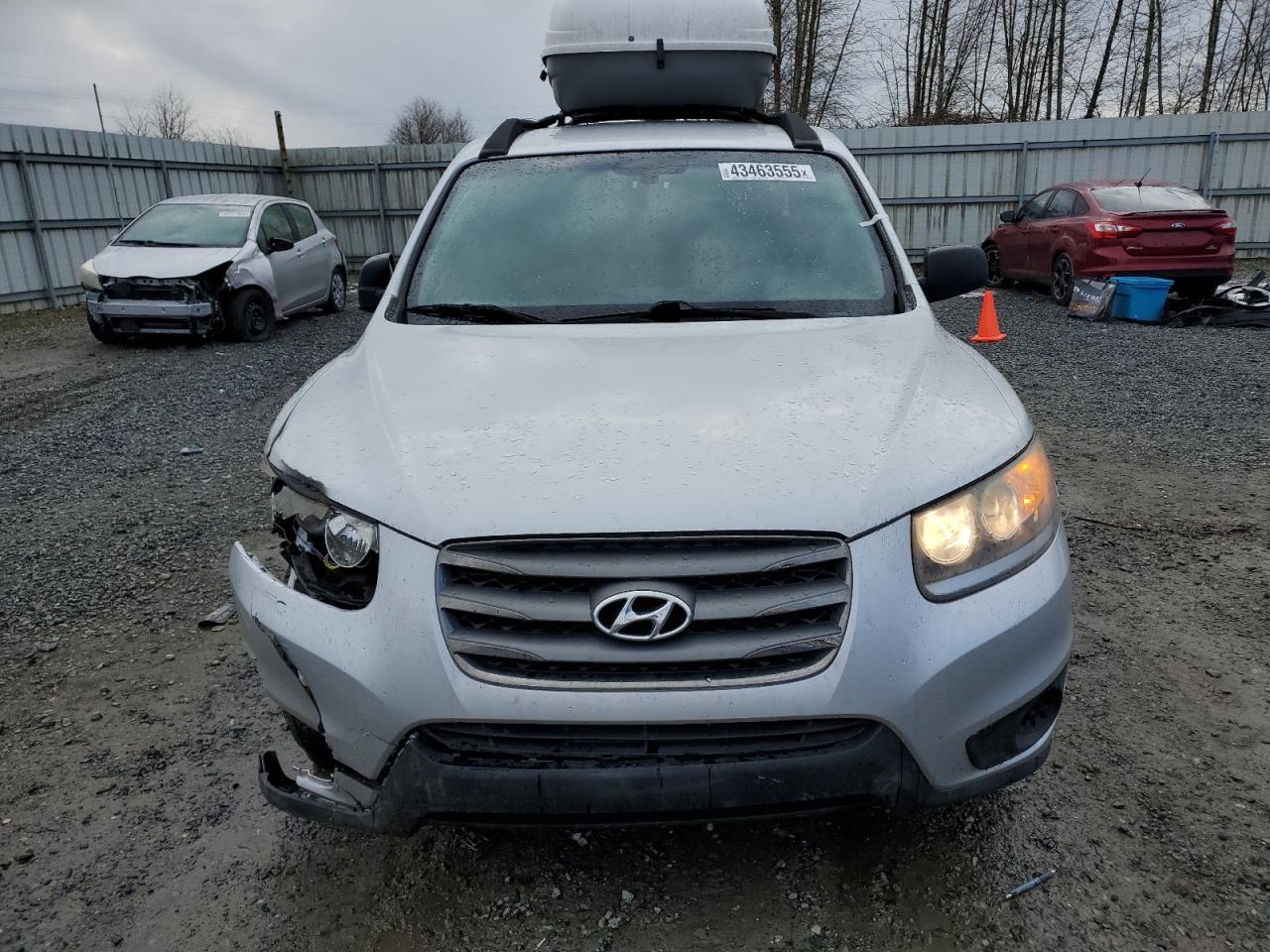 2012 Hyundai Santa Fe VIN 5XYZGDAB8CG106690 Copart auction photo, front end / side damage thumbnail 5