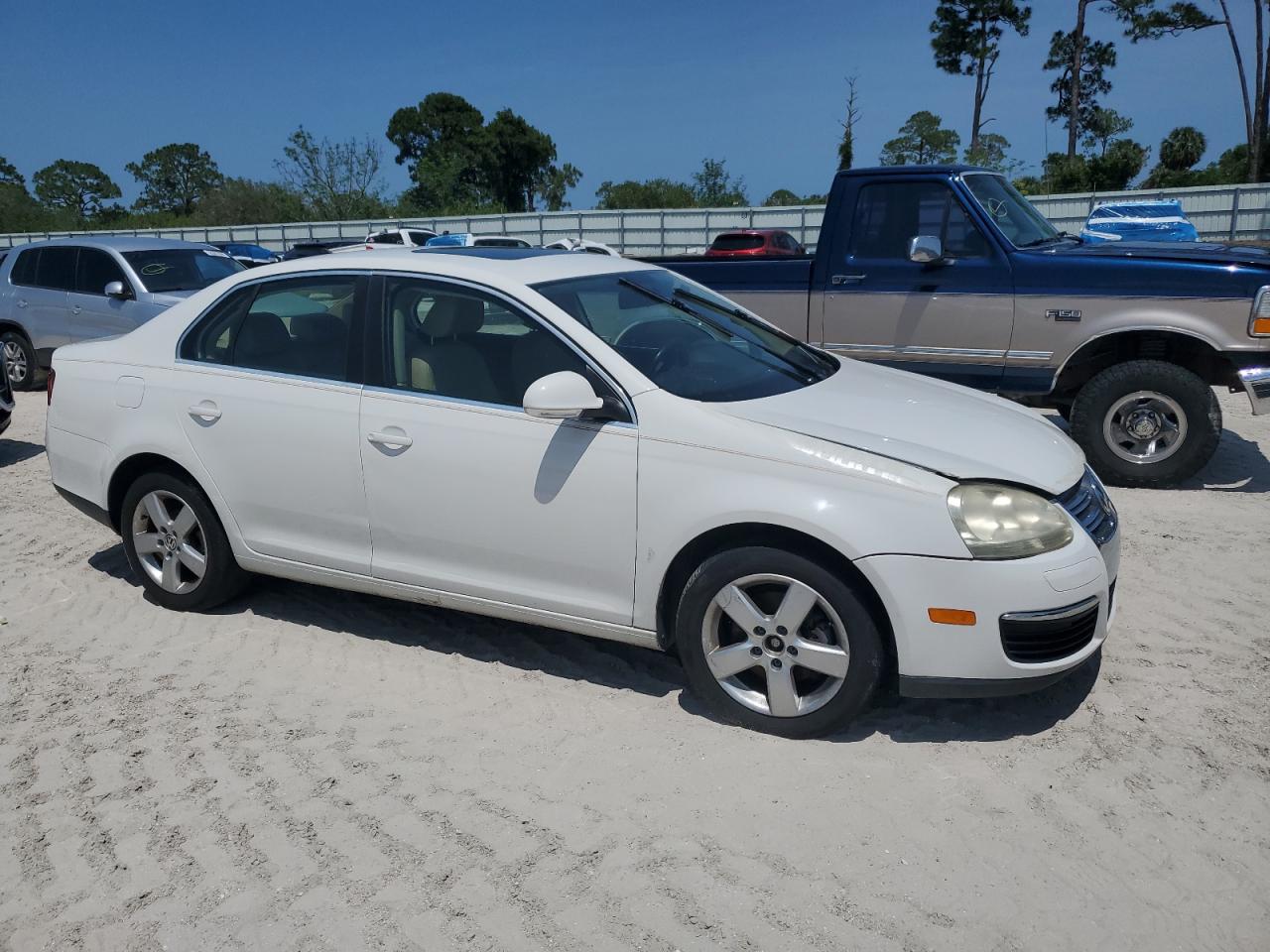 2009 Volkswagen Jetta VIN 3VWRM71K69M068072 Copart auction photo, front end / hail damage thumbnail 4