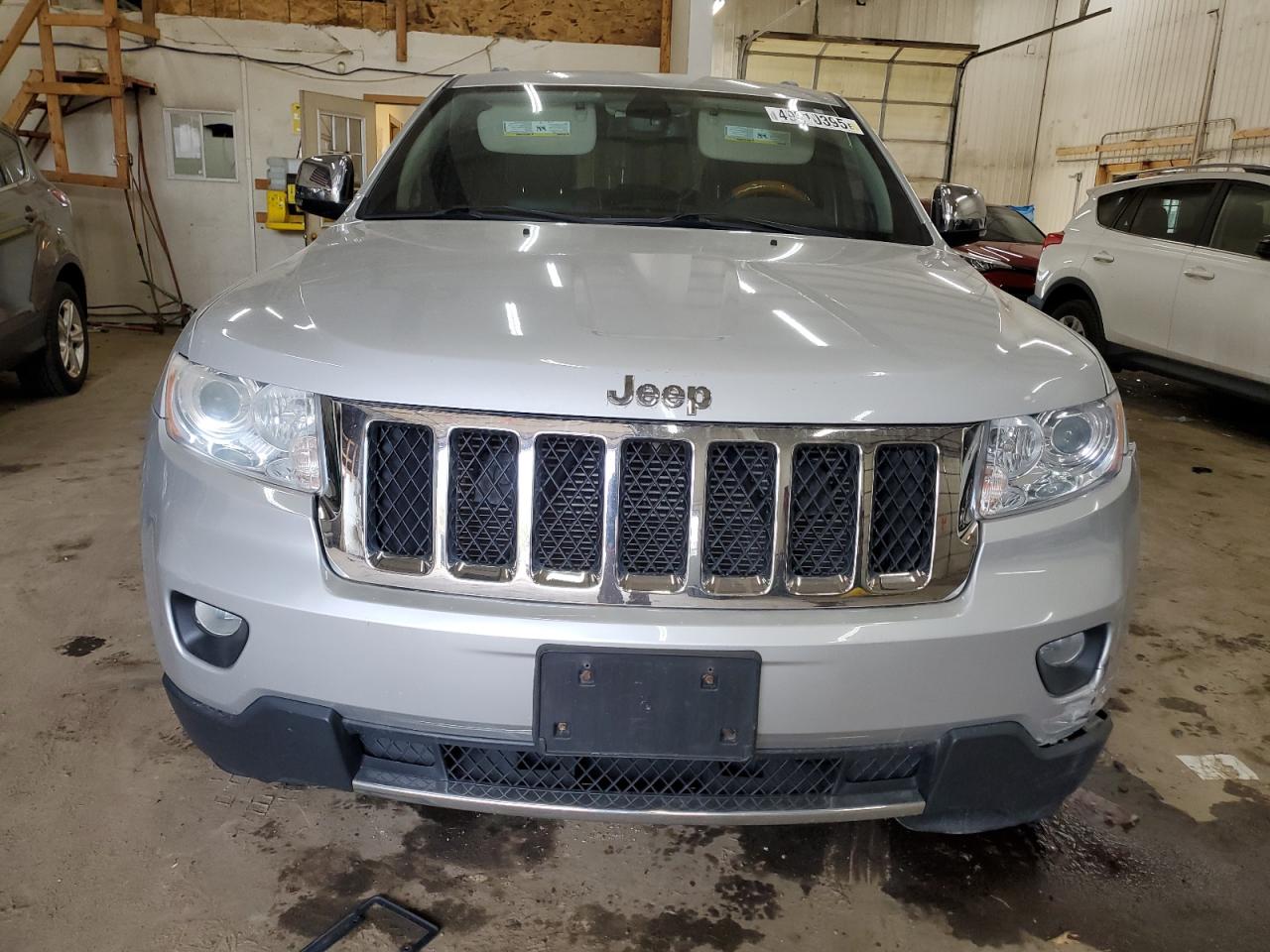 2011 Jeep Grand Cherokee VIN 1J4RR6GG4BC744778 Copart auction photo, front end damage thumbnail 5