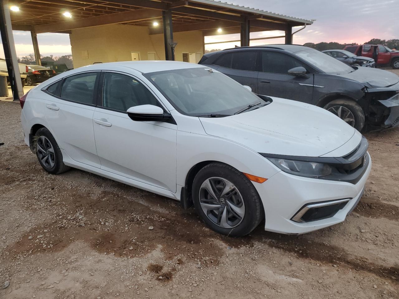2020 Honda Civic VIN 19XFC2F65LE015582 Copart auction photo, side damage thumbnail 4