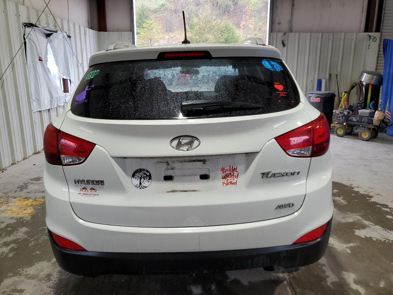 2010 Hyundai Tucson VIN KM8JUCAC6AU111919 Copart auction photo, front end / undercarriage damage thumbnail 6