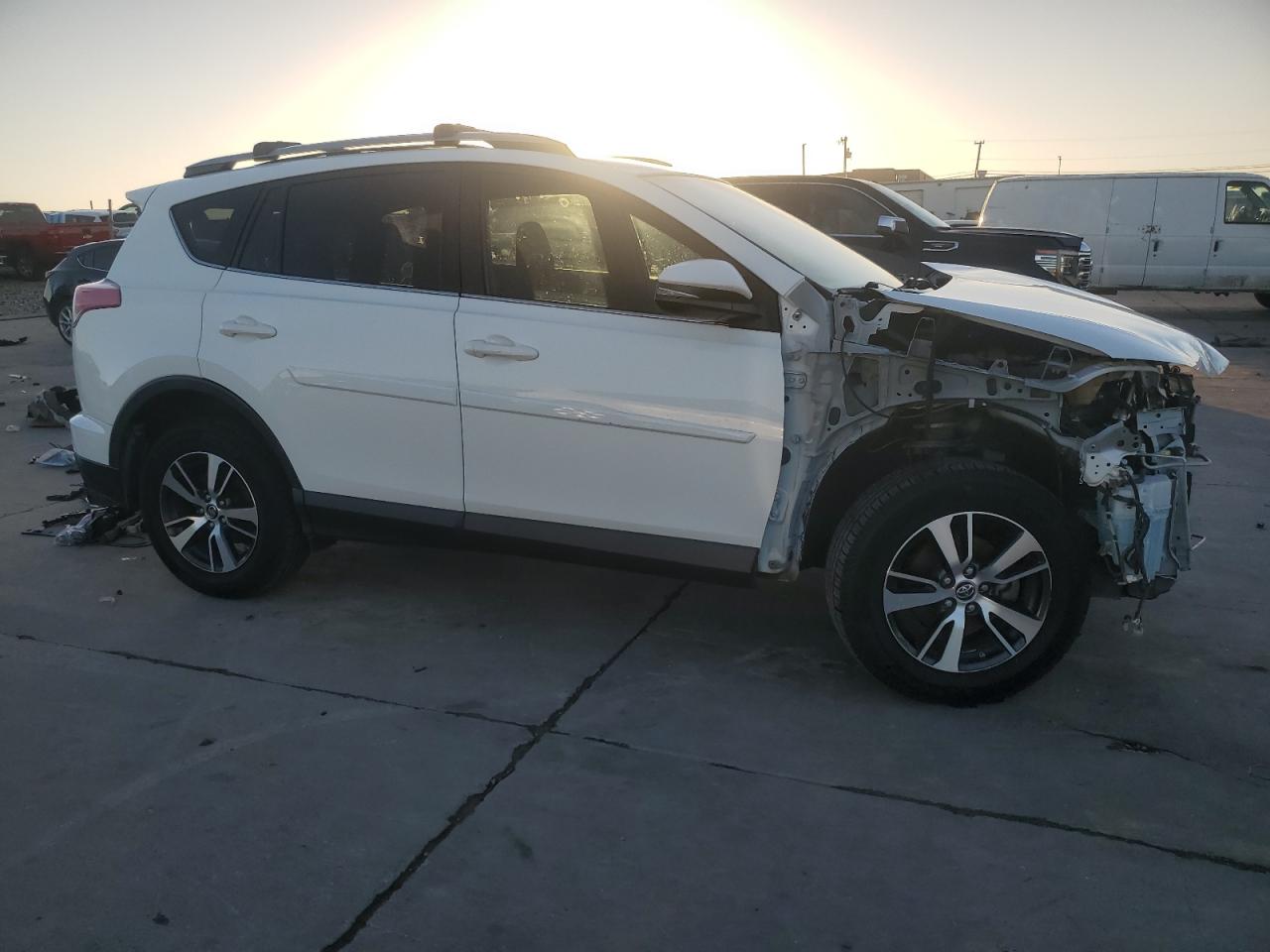 2017 Toyota RAV 4 VIN JTMWFREV9HJ721764 Copart auction photo, front end damage thumbnail 4
