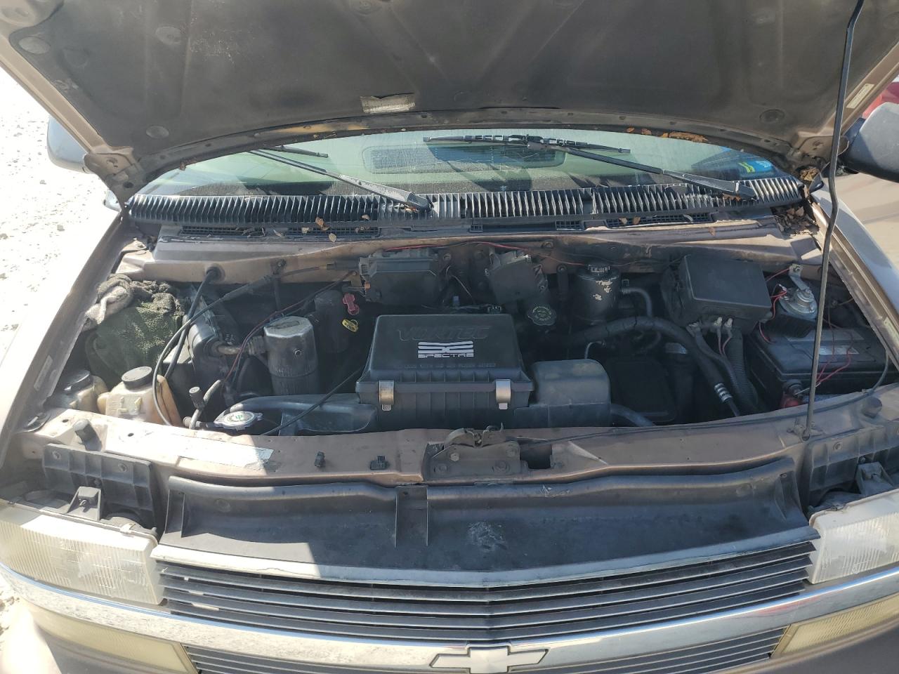 2000 Chevrolet Astro VIN 1GNDM19WXYB150711 Copart auction photo, side / hail damage thumbnail 12