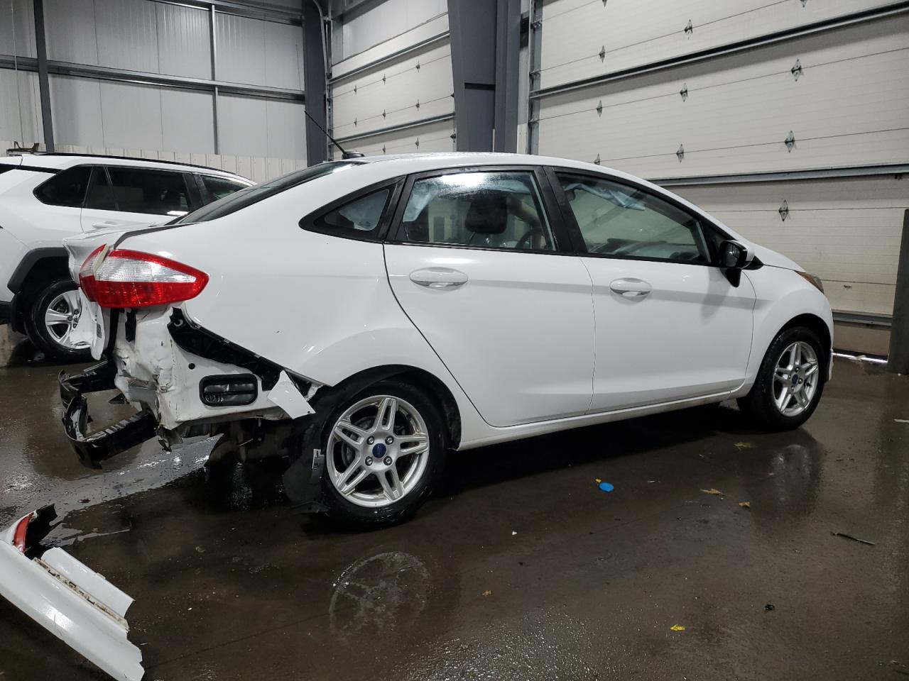 2017 Ford Fiesta VIN 3FADP4BJ4HM115290 Copart auction photo, rear end / front end damage thumbnail 3