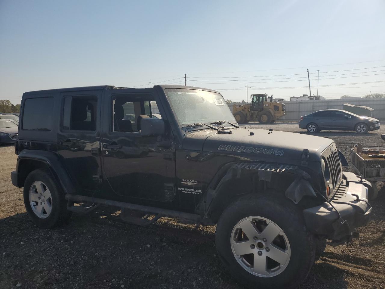 2011 Jeep Wrangler VIN 1J4BA5H10BL634002 Copart auction photo, front end / top/roof damage thumbnail 4