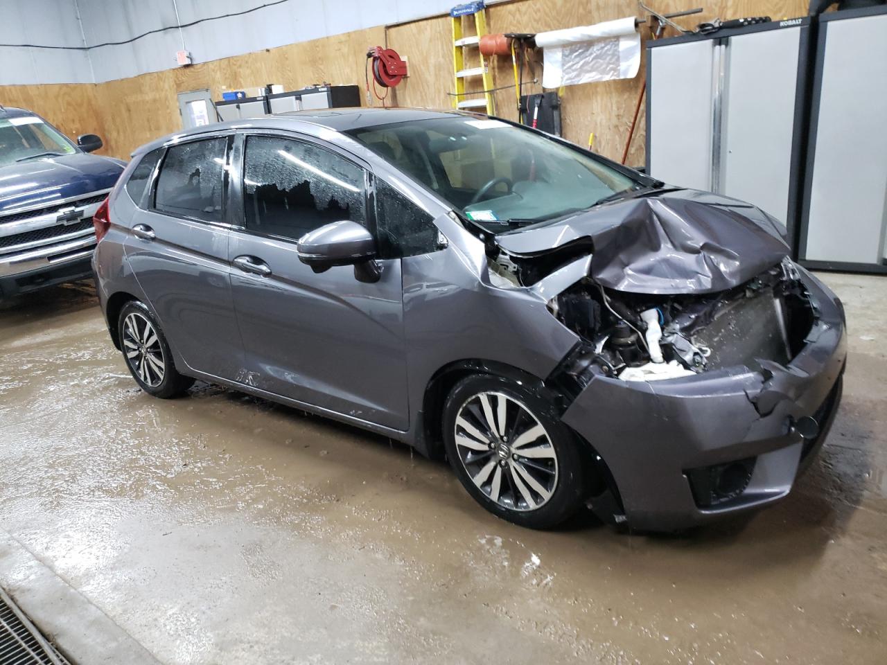 2015 Honda Fit VIN 3HGGK5H89FM747538 Copart auction photo, front end / minor dent/scratches damage thumbnail 4