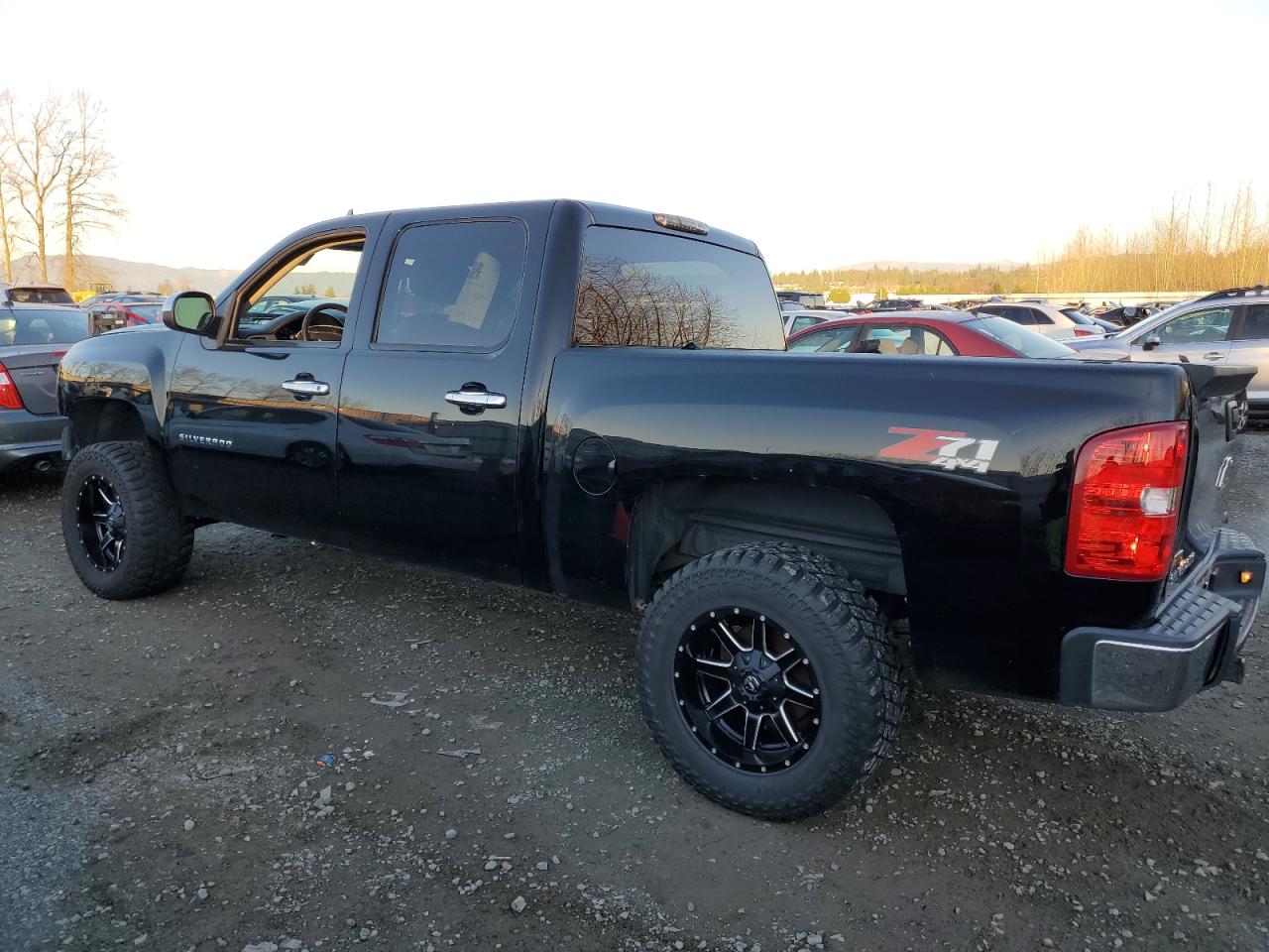 2012 Chevrolet Silverado VIN 3GCPKTE71CG119255 Copart auction photo, front end damage thumbnail 2