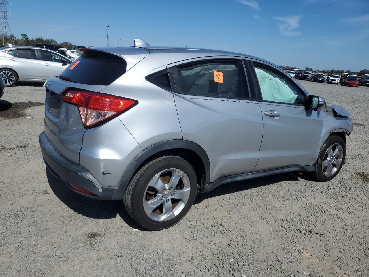 2016 Honda HR-V VIN 3CZRU5H56GM723457 Copart auction photo, front end / side damage thumbnail 3