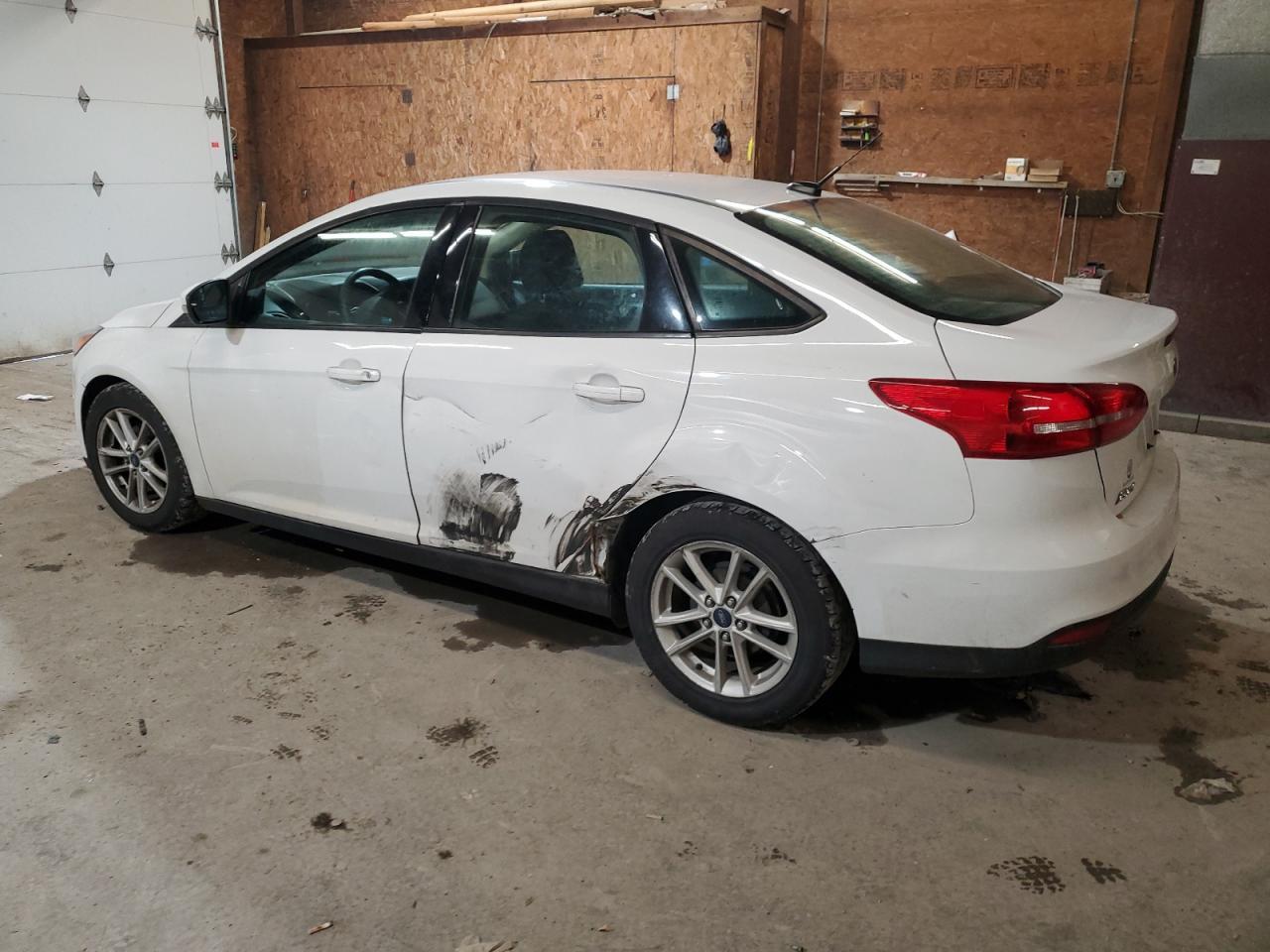 2016 Ford Focus VIN 1FADP3F21GL237425 Copart auction photo, side / front end damage thumbnail 2