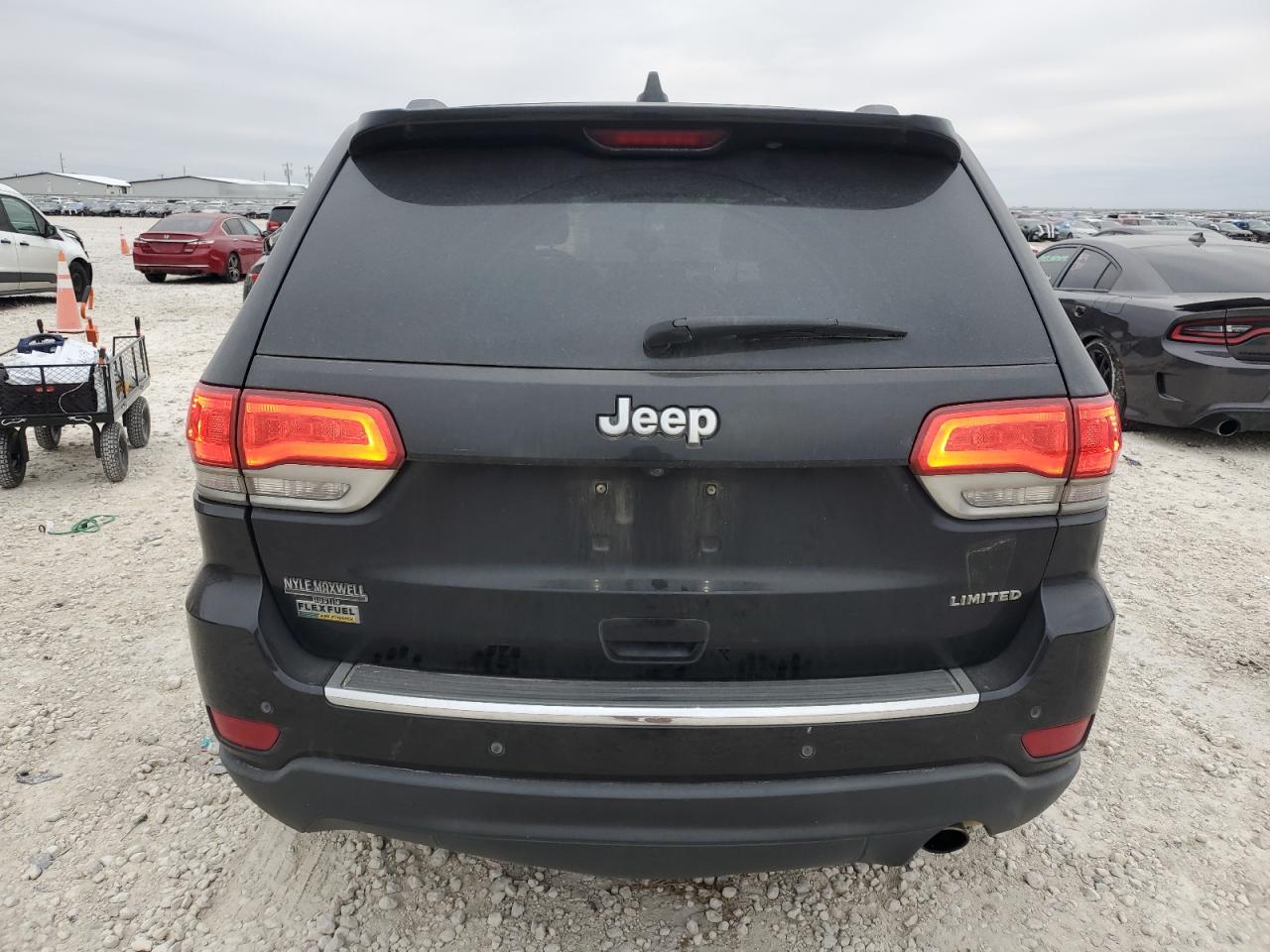 2015 Jeep Grand Cherokee VIN 1C4RJEBG4FC217537 Copart auction photo, all over damage thumbnail 6